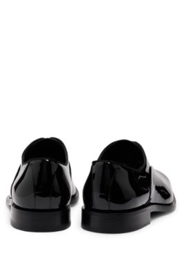 Patent-leather Oxford shoes with stitching details, Black