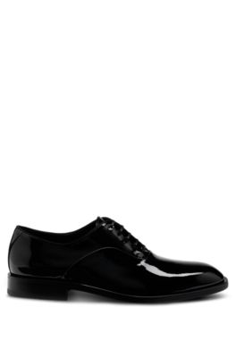 Patent-leather Oxford shoes with stitching details, Black