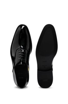 Patent-leather Oxford shoes with stitching details, Black