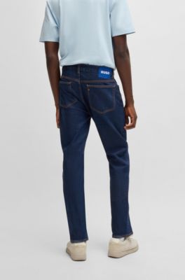 Jeans slim fit de denim el&aacute;stico en azul oscuro, Azul