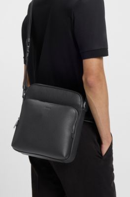 Embossed-logo reporter bag in Italian leather