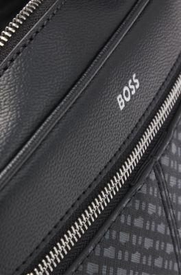 Faux-leather washbag with monogram-print front pocket, Black