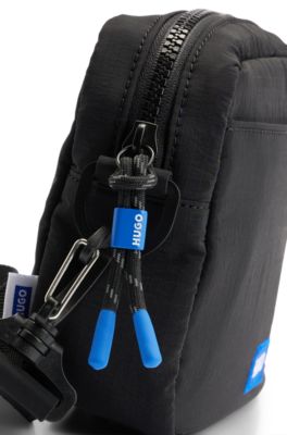 Reporter bag with logo patch and detachable strap, Black