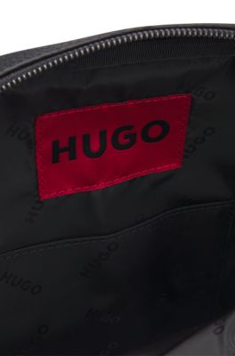 Grained mono-strap backpack with stacked logo, Black