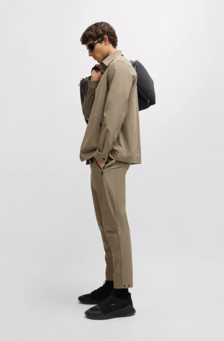 Tapered-leg trousers in water-repellent stretch fabric