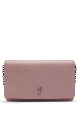BOSS - NAOMI x BOSS leather clutch bag with signature hardware