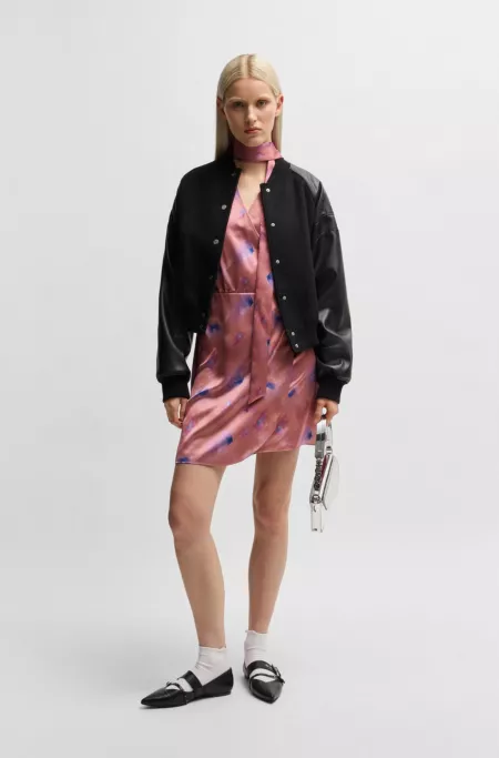 Wrap-front dress with butterfly print and button cuffs