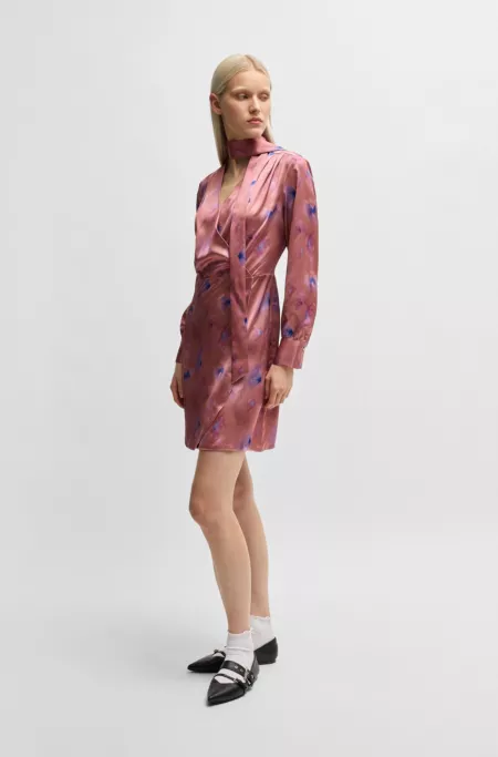 Wrap-front dress with butterfly print and button cuffs