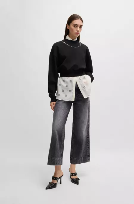 Wide-leg jeans in black rigid denim