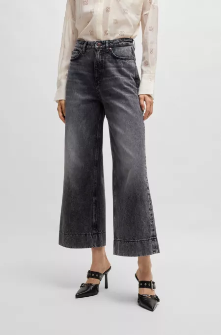 Wide-leg jeans in black rigid denim
