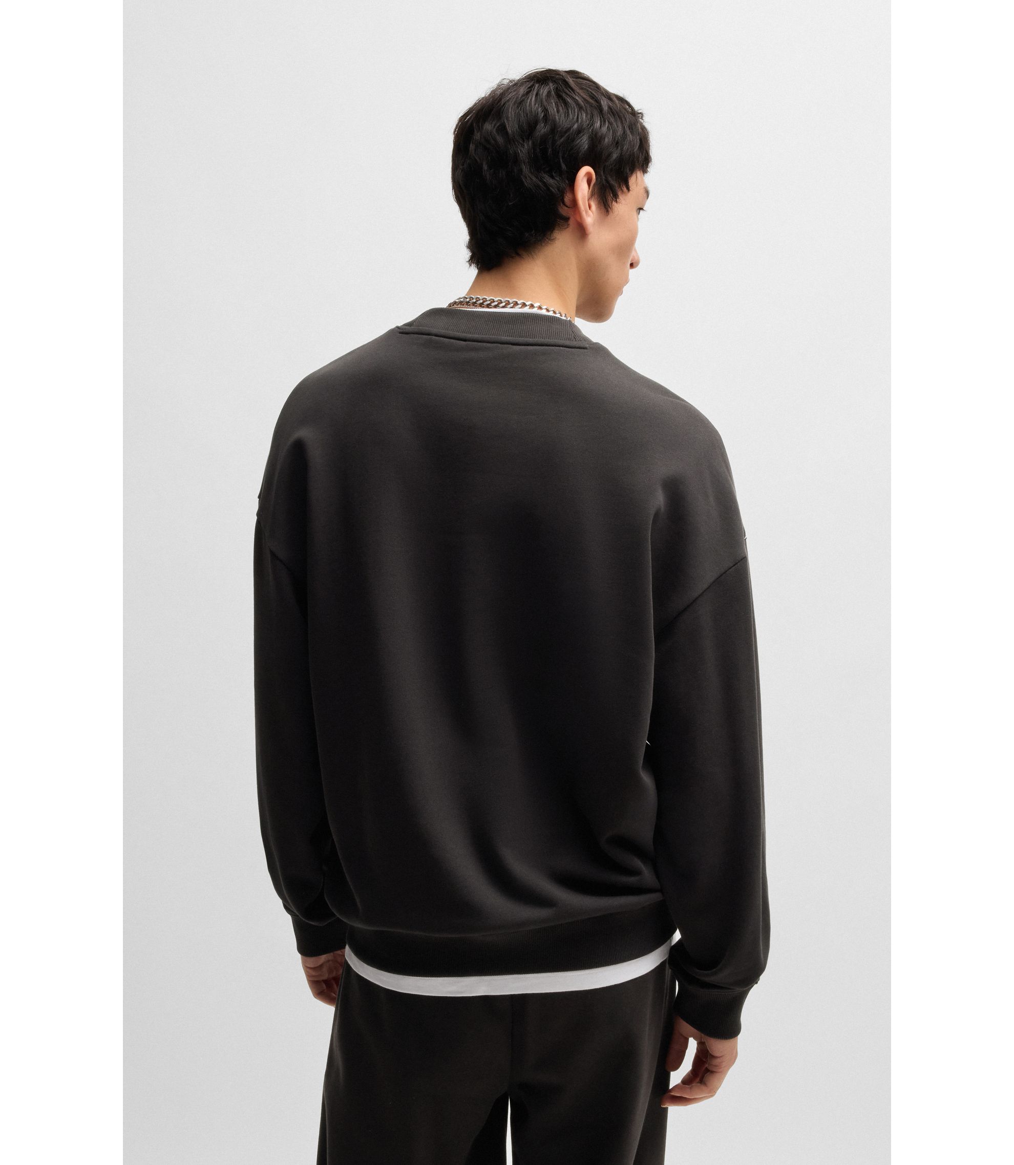 HUGO - Cotton-terry sweatshirt with chain-stitch logo - Black