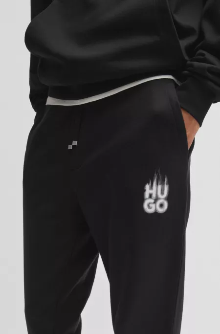 Cotton-terry tracksuit bottoms with smoke logo