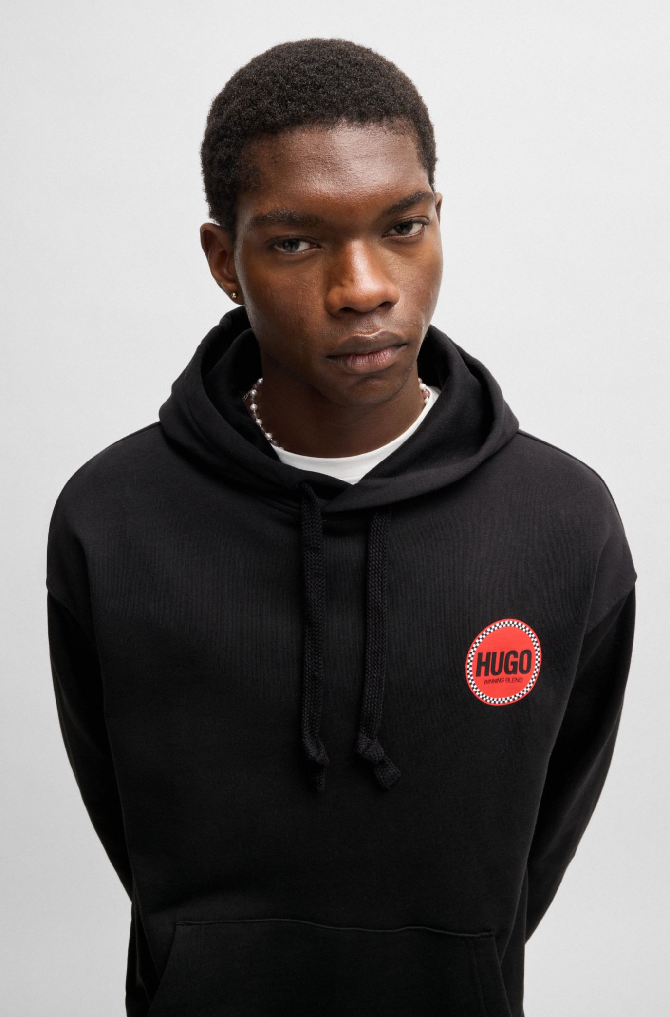 HUGO - Cotton-terry relaxed-fit hoodie with logo prints - Black