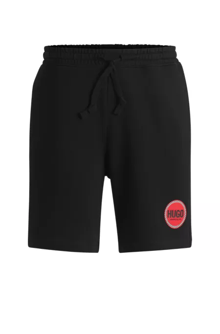 Cotton-terry relaxed-fit shorts with logo print