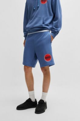 Shorts relaxed fit de felpa de algod&oacute;n con logo estampado, Celeste