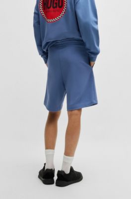 Shorts relaxed fit de felpa de algod&oacute;n con logo estampado, Celeste