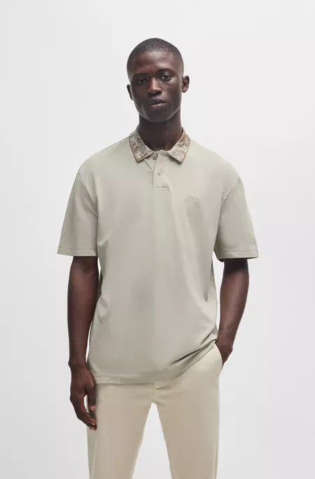 Cotton-piqué polo shirt with jungle-artwork collar