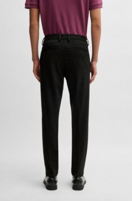 Pantalones slim fit de punto el&aacute;stico con acabado jaspeado, Negro