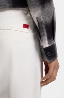 Slim-fit trousers in stretch-cotton gabardine, White