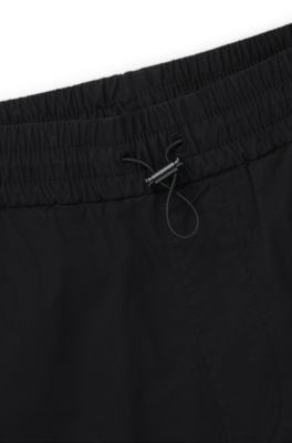 Regular-fit trousers in paper-touch cotton, Black