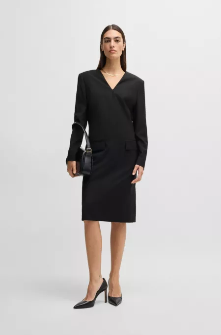 Tailored V-neck dress with flap pockets in relaxed fit