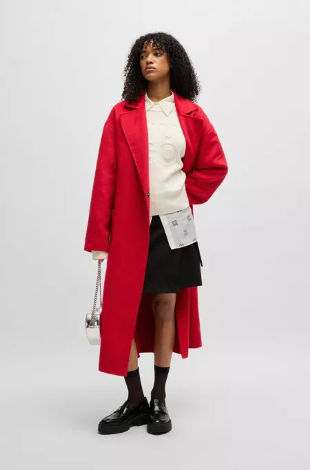 Wrap mini skirt with branded belt buckle