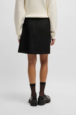 Wrap mini skirt with branded belt buckle, Black