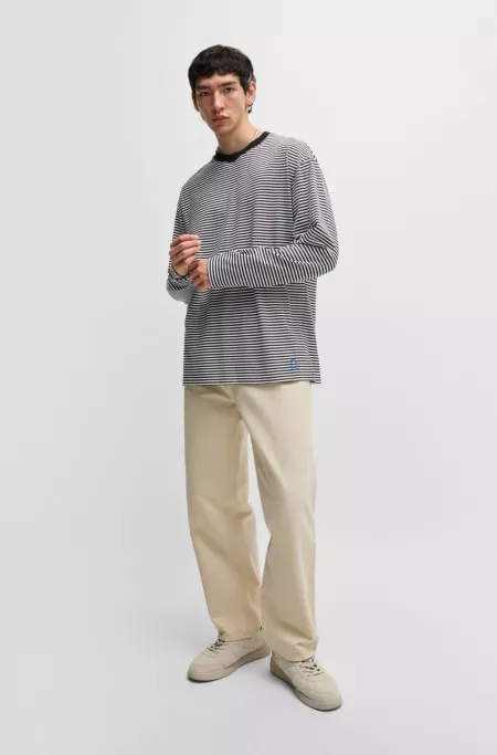 Baggy-fit trousers in cotton canvas