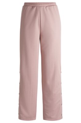 Oversize-fit tracksuit bottoms with logo jacquard, Patterned