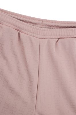 Oversize-fit tracksuit bottoms with logo jacquard, Patterned