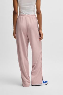 Oversize-fit tracksuit bottoms with logo jacquard, Patterned