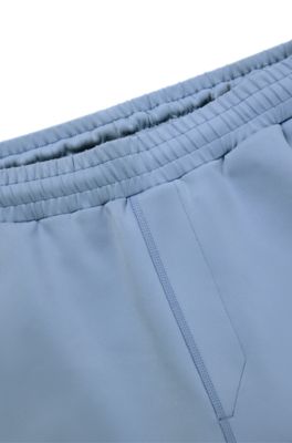 Shorts deportivos en tejido de secado r&aacute;pido con logo reflectante, Celeste