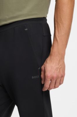 Quick-dry trousers with reflective branding, Black