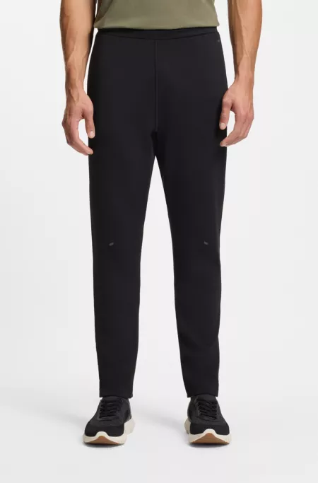 Quick-dry trousers with reflective branding