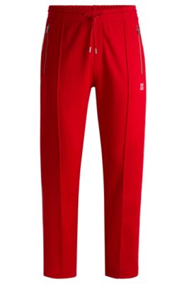 Tracksuit bottoms with checked tape, Red