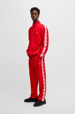 Tracksuit bottoms with checked tape, Red