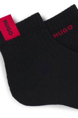Lot de deux paires de chaussettes courtes c&ocirc;tel&eacute;es &agrave; logos, Noir