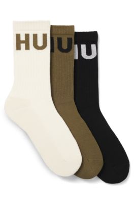 Paquete de tres pares de calcetines cortos en canal&eacute; con logos, Cal