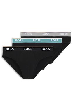 Paquete de tres calzoncillos slip de algodón elástico con logos en la cintura