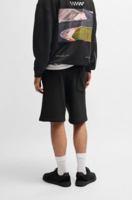 Shorts de algod&oacute;n con estampado de carreras, Negro