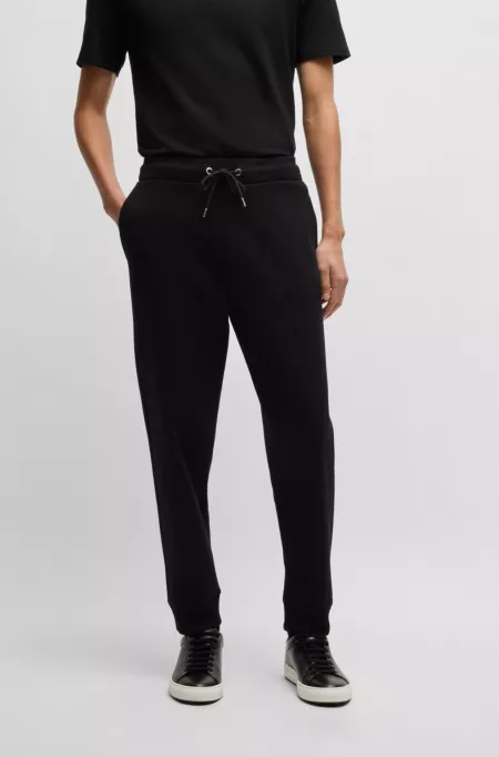 Mercerized-cotton tracksuit bottoms with stripe waistband