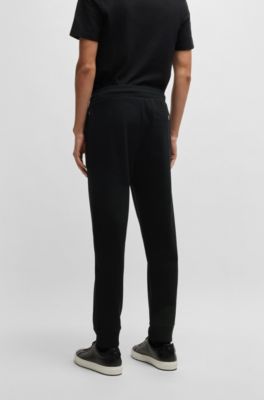 Mercerized-cotton tracksuit bottoms with stripe waistband, Black