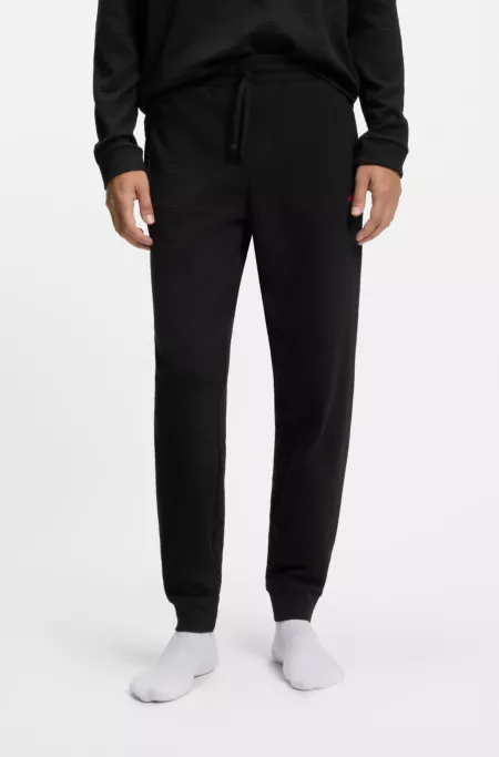 Embroidered-logo pyjama bottoms in a cotton blend