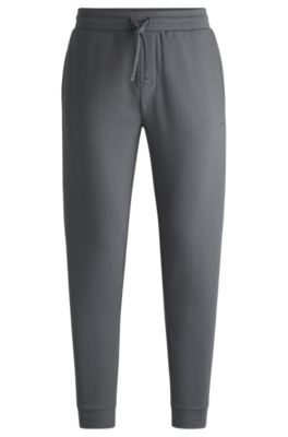 Pantalones de pijama de algod&oacute;n con logo bordado, Gris claro