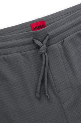 Pantalones de pijama de algod&oacute;n con logo bordado, Gris claro