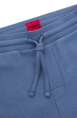 Pantalones de pijama de algod&oacute;n con logo bordado, Celeste
