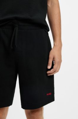 Shorts de pijama con estructura de rejilla y logo bordado, Negro