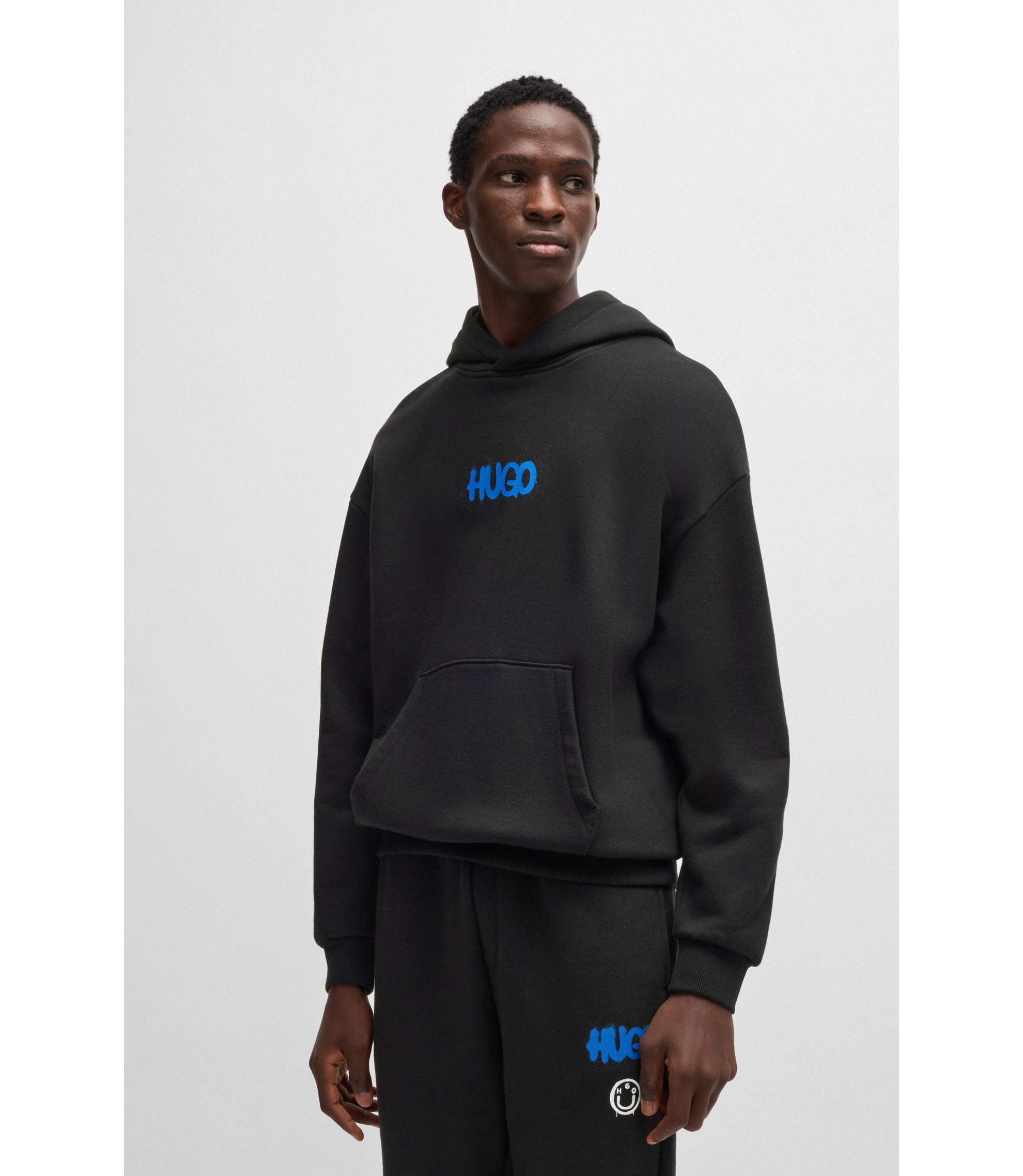 ヒューゴボス フーディブルゾン XL HUGO - Cotton-terry hoodie with Happy HUGO logo on back - Black
