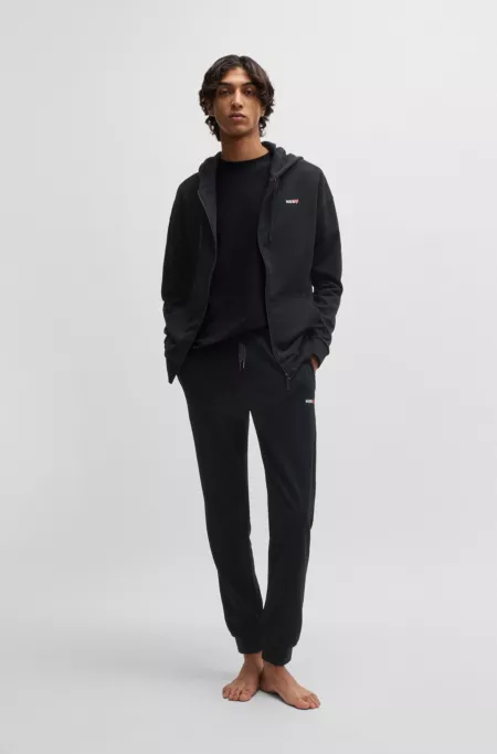 tracksuit bottoms with heart logo