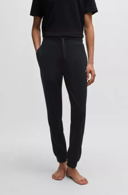 tracksuit bottoms with heart logo